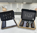 Shift The Full Shift cleaning kit featuring refillable glass spray bottles, cleaning pods, and microfiber cloths.